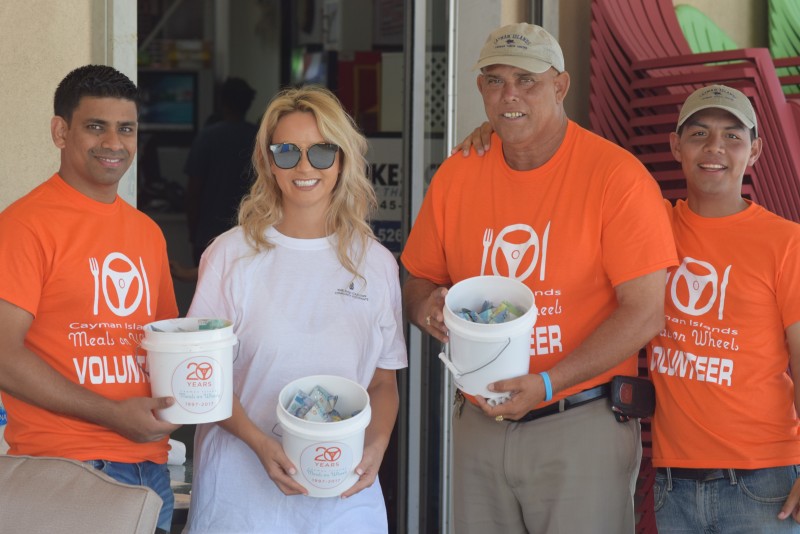 CTC team collect donations for CAyman Meals on Wheels
